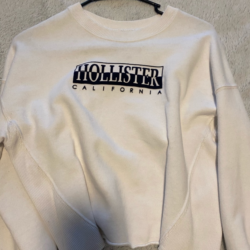 Cropped long sleeve sweater